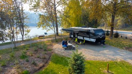 Two people enjoying the Quesnel Downtown RV Park & Campground